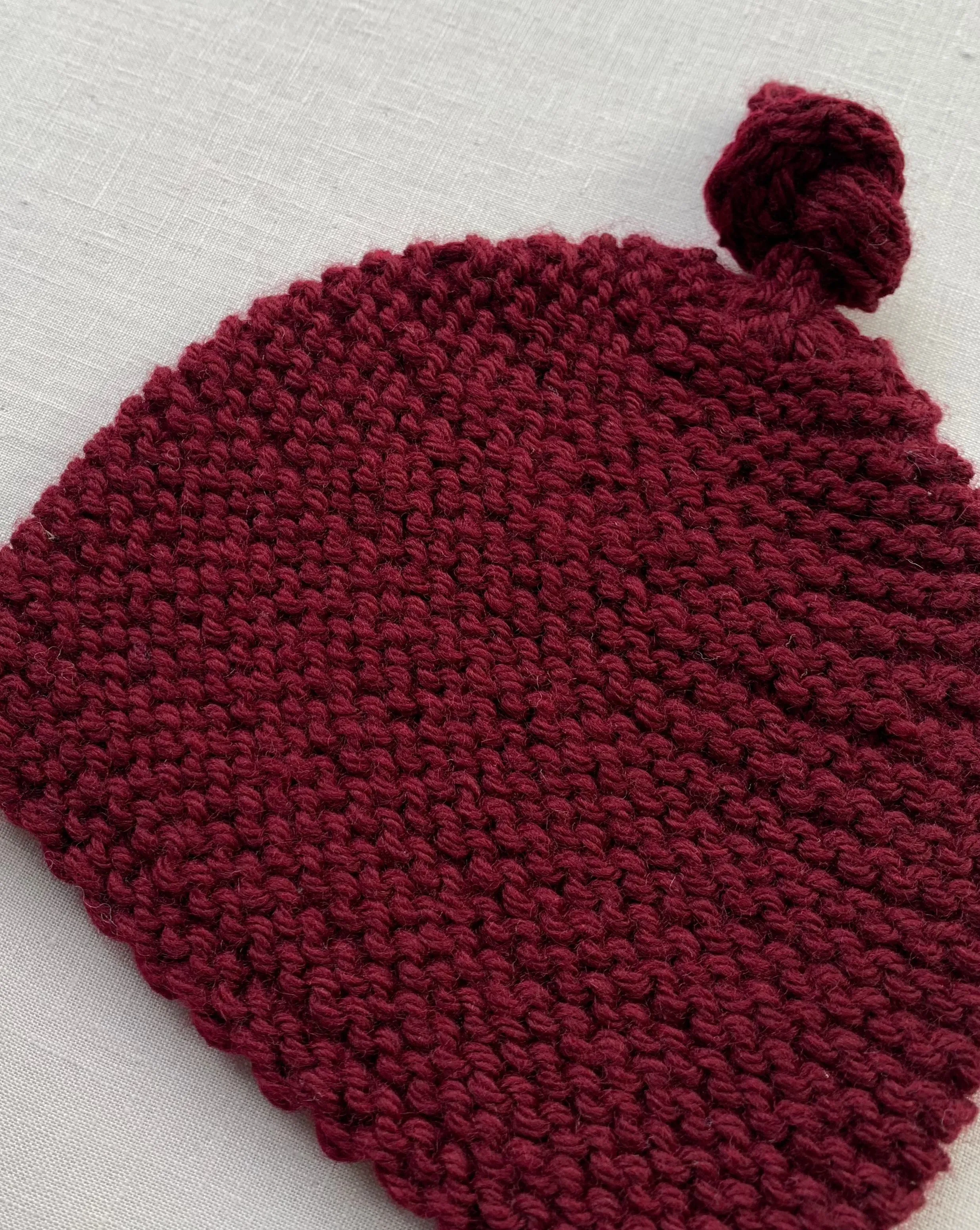 Knitted by Nana Merino Beanie - Sangria