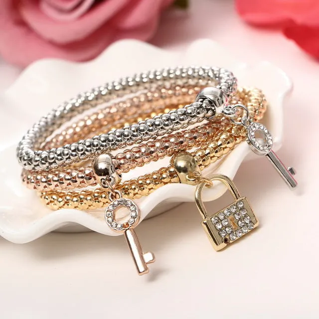 New! 3 Bracelets with Bangles - Free Shipping Anywhere In North America. Please allow 2-4 weeks for delivery