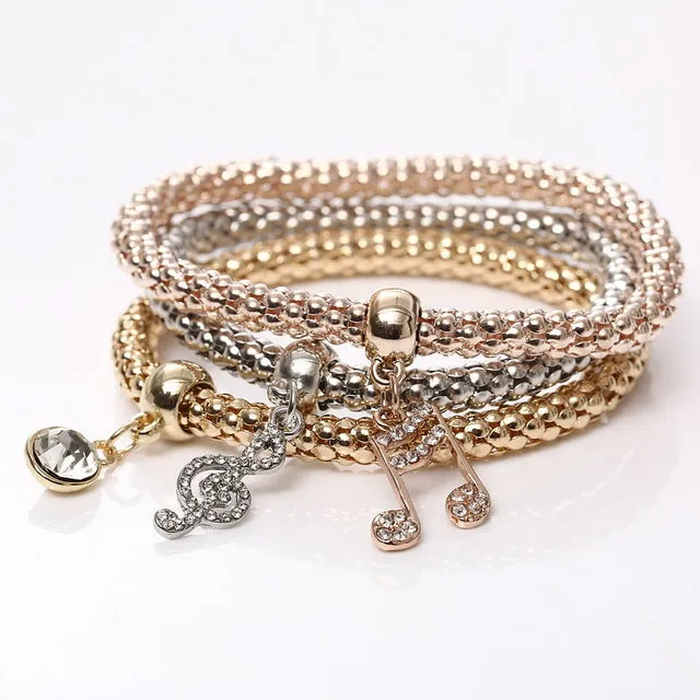 New! 3 Bracelets with Bangles - Free Shipping Anywhere In North America. Please allow 2-4 weeks for delivery