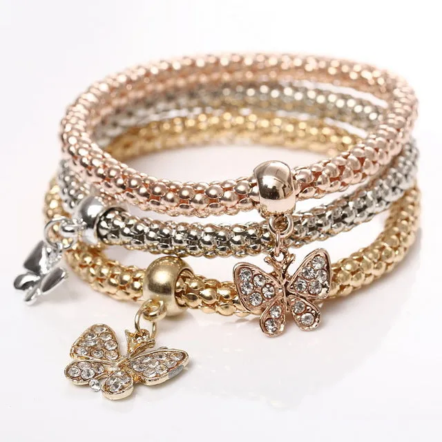 New! 3 Bracelets with Bangles - Free Shipping Anywhere In North America. Please allow 2-4 weeks for delivery