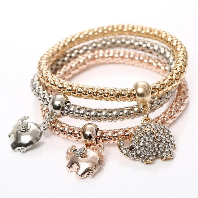 New! 3 Bracelets with Bangles - Free Shipping Anywhere In North America. Please allow 2-4 weeks for delivery